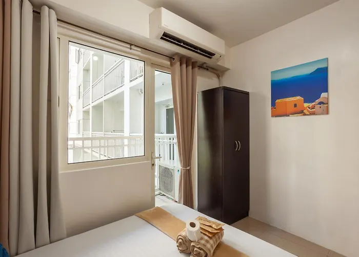 アパート Ideal Suites Moa - 1 Bedroom At Shore Residences マニラ市